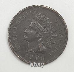 1904 Penny indienne frappée plusieurs fois et décentrée.