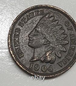 1904 Penny indienne frappée plusieurs fois et décentrée.